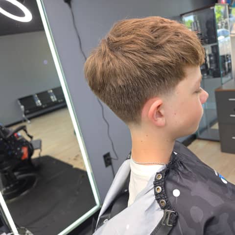 Haircut and grooming work at Legacy Studio Barbershop