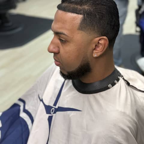 Haircut and grooming work at Legacy Studio Barbershop