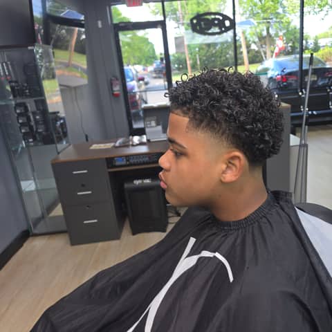 Haircut and grooming work at Legacy Studio Barbershop