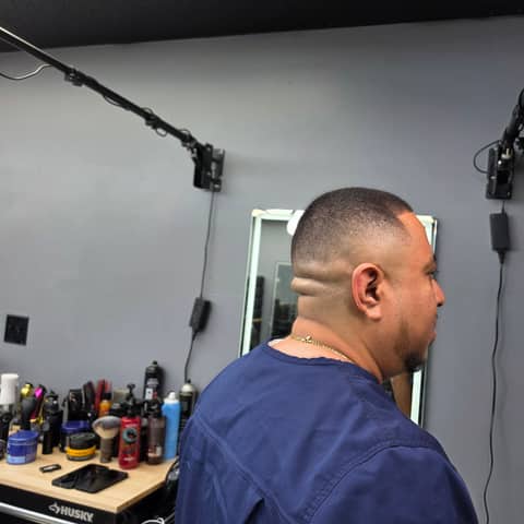 Haircut and grooming work at Legacy Studio Barbershop