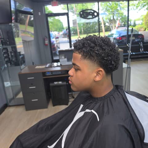 Haircut and grooming work at Legacy Studio Barbershop