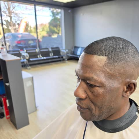 Haircut and grooming work at Legacy Studio Barbershop