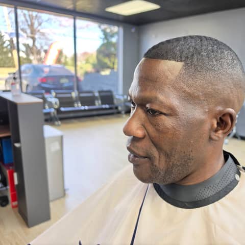 Haircut and grooming work at Legacy Studio Barbershop