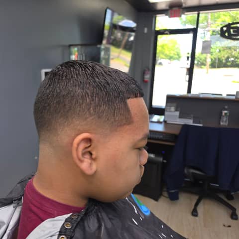 Haircut and grooming work at Legacy Studio Barbershop
