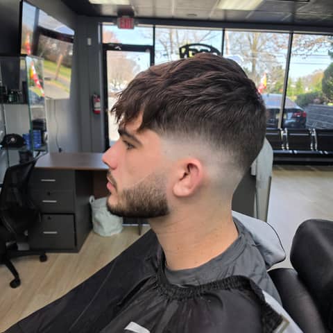 Haircut and grooming work at Legacy Studio Barbershop