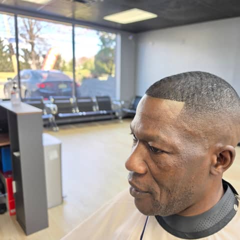 Haircut and grooming work at Legacy Studio Barbershop